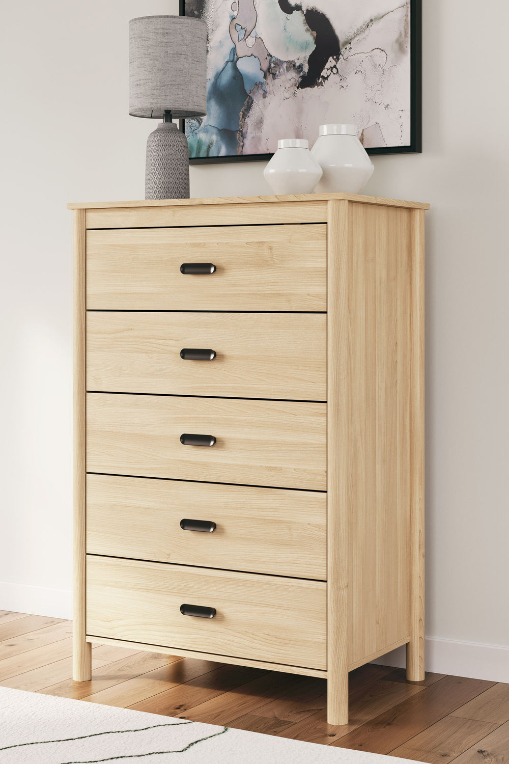 This chest of drawers brings on-trend style and a sense of serenity to the bedroom. Invitingly simple, its spacious drawers give you plenty of space to store your wardrobe. Best of all, the natural wood finish and relaxed warmth complement any interior de
