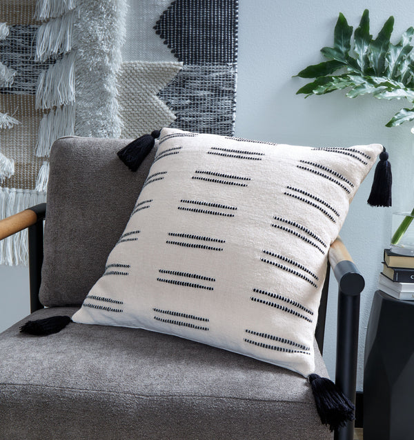  suiting spaces from casual to contemporary. With black tassels on each corner
