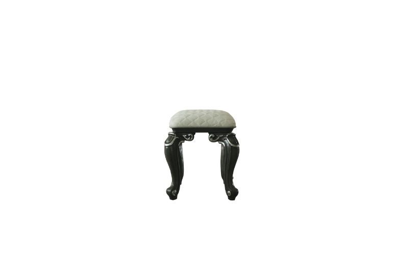 Both decorative and versatile, this delicate stool has a soft seat and elelgant scrolled legs. The mature grey finish all over the wooden frame perfectly coordinates with the clean, white upholstery. Getting extra seating while adding a little classic cha