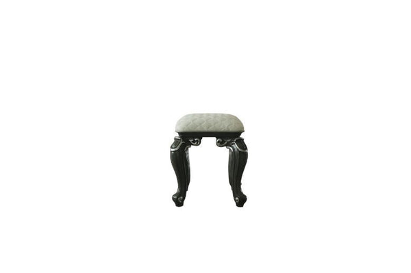  this delicate stool has a soft seat and elelgant scrolled legs. The mature grey finish all over the wooden frame perfectly coordinates with the clean