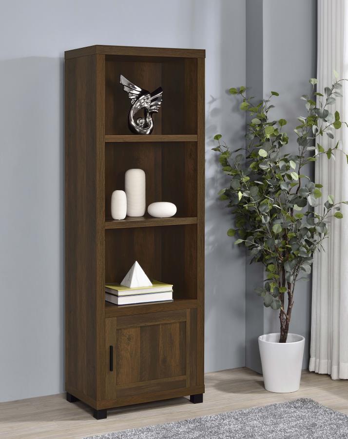 Conveniently designed in a vertical orientation, the Sachin media tower saves precious space in your compact or large living space. Make the most of a rustic look with a tower built of wood products with engineered veneer. Earth-inspired finishes mesh wit
