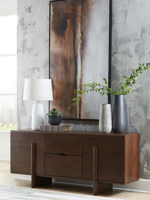  linear design is draped with an inviting medium brown finish. An angular base further emboldens the look with forward-thinking style. Storage has never been so striki