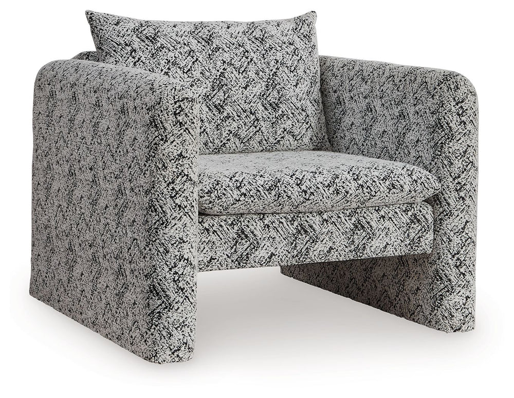This fashion-forward accent chair keeps comfort and contemporary style at top of mind. Its eye-catching black and white geometric pattern makes a bold statement while remaining versatile enough to pair with other neutrals or pops of color. A low-profile b