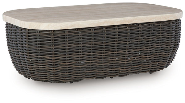 Add luxury, convenience and durability to alfresco fun. This outdoor coffee table captures the textural beauty of wicker while withstanding the elements, from rain to shine. With its marble-look aluminum top, you can stylishly stage decor or keep snacks a