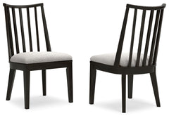 This dining chair brings a rustic vibe to urban contemporary design. Itâ€™s a modern approach to natural beauty, with an aged black finish defining the chic curved backrest. And the chairâ€™s color palette is stunningly simple, allowing it to coordinate s