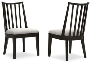 This dining chair brings a rustic vibe to urban contemporary design. Itâ€™s a modern approach to natural beauty, with an aged black finish defining the chic curved backrest. And the chairâ€™s color palette is stunningly simple, allowing it to coordinate s