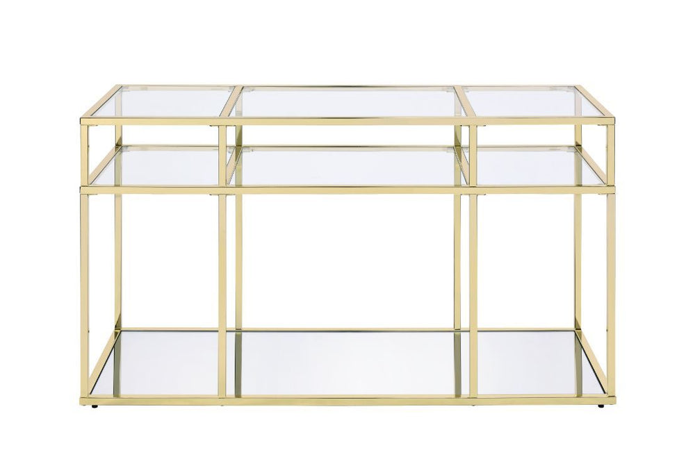 Modern simplicity makes your space feel uncluttered and stylish. The Uchenna Sofa Table has a brilliant color and lustrous finish to enhance it-'s sleek modern silhouette. Metal table frame in a gold finish exudes lustrous shine, topped with tempered glas