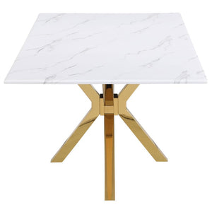  features a gleaming white marble table top adorned wi