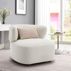 Enhance your living space with this Darius collection accent chair, featuring a cozy pillow and upholstered in luxurious red and beige boucle fabric. Its modern design, combined with the soft, inviting texture, makes it the perfect addition to any room. W