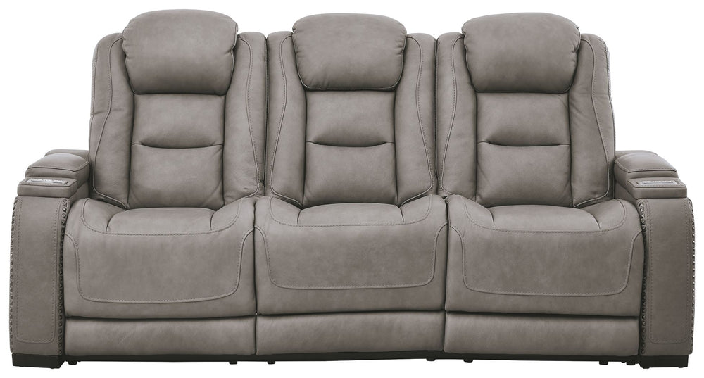 Reserved for him and made for her, this power reclining sofa in gray delivers all the comfort and style you could ask for. Inspired by sports car interiors, the expertly matched leather and faux leather upholstery has a â€œperforated automotiveâ€ treatme