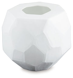 Equal parts elegant and organic, this vase brings ethereal beauty to your tabletop. Its white finish seamlessly harmonizes with existing accents. Meticulous craftsmanship creates the unique, faceted look of the hand-carved surface and makes each piece one