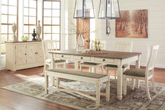 Unique two-tone finish with a combination of Oak and Acacia substrates combining a trendy textured antique white color with table and server tops finished in a textural weathered oak finish. Rectangular dining table features six convenient drawers for sto