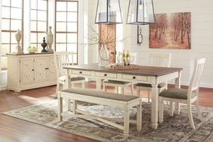 Unique two-tone finish with a combination of Oak and Acacia substrates combining a trendy textured antique white color with table and server tops finished in a textural weathered oak finish. Rectangular dining table features six convenient drawers for sto