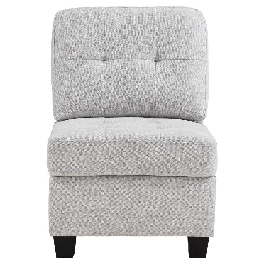Build the sectional that suits your space with a modern armless chair. In soft beige upholstery, it-'s the perfect way to extend your Georgina collection sectional sofa, adding length to suit your living room. The chair features tufted cushions and sinuou