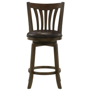  the stool boasts a 360-degree swivel seat with plush foam padding. Its dark brown faux leather upholstery is smooth and inviting