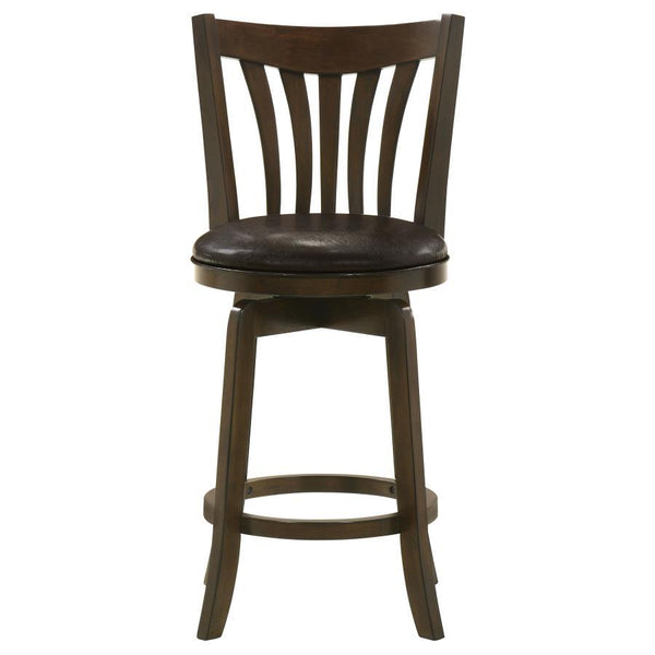  the stool boasts a 360-degree swivel seat with plush foam padding. Its dark brown faux leather upholstery is smooth and inviting