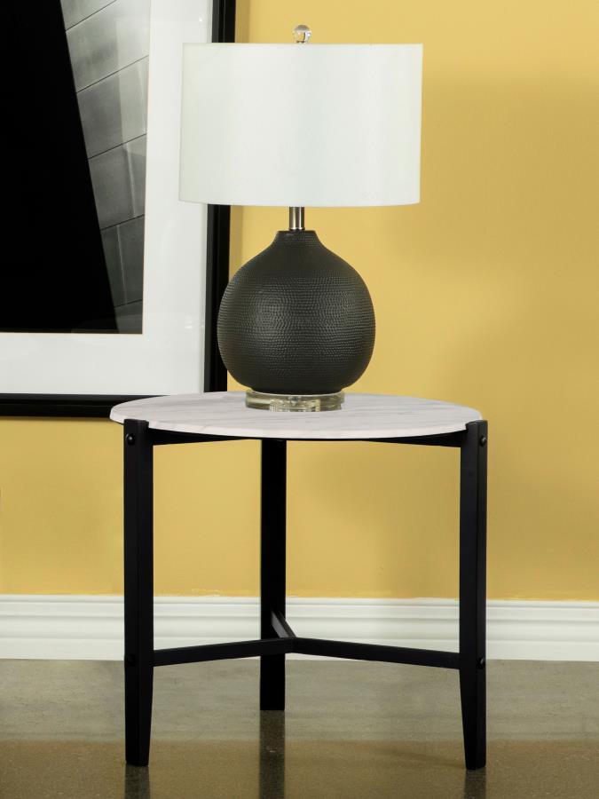 Elevate your living space with this modern end table, featuring a minimalist design. Its slim black solid rubberwood legs form a tripod-like base, supporting a round top with a faux white marble-inspired finish. The high-pressure laminate surface has a te