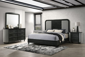 The Skyline 4-Piece Bedroom Set blends modern style with durability. Crafted from solid Rubberwood, engineered woods, and Ash veneers, it features an Onyx Black finish with gray glazing that enhances the wood grain. The upholstered panel bed adds plush co