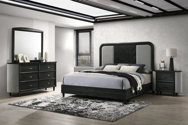 The Skyline 4-Piece Bedroom Set blends modern style with durability. Crafted from solid Rubberwood, engineered woods, and Ash veneers, it features an Onyx Black finish with gray glazing that enhances the wood grain. The upholstered panel bed adds plush co