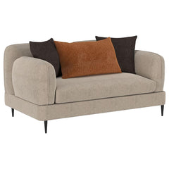 The loveseat blends chic architectural elements with cozy sophistication, wrapped in latte chenille upholstery for a soft, textured feel. Its rounded, sculpted track arms and matching back provide a harmonious design, accented by a sleek waterfall bench s
