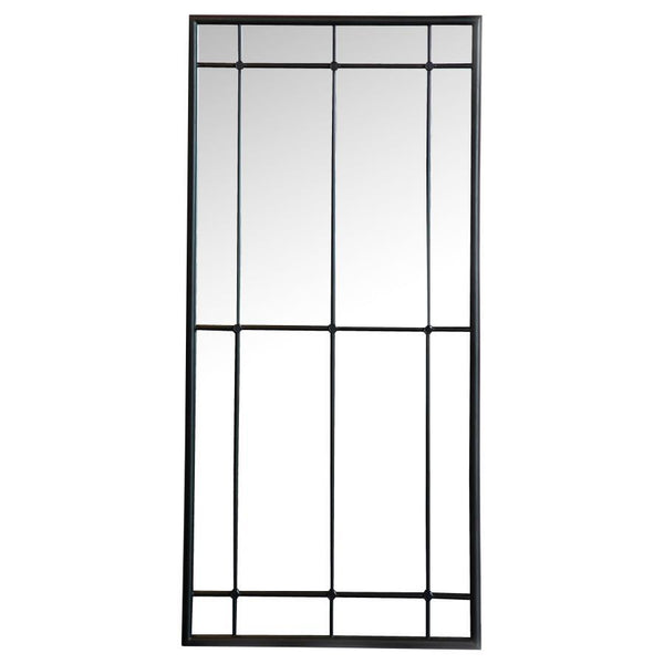 This tall French windowpane mirror features a vertical grid design that adds both elegance and architectural structure. Its elongated form enhances the illusion of ceiling height, while the black metal frame and linear trim offer strong contrast and class