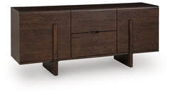 This accent cabinet expertly blends function with stunning contemporary form. Its clean, linear design is draped with an inviting medium brown finish. An angular base further emboldens the look with forward-thinking style. Storage has never been so striki