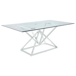 Elevate your dining space with this contemporary dining table featuring a 12mm clear glass top and an artistic polished stainless steel base. The angular geometric design adds a modern flair, while the rectangular shape offers generous space for entertain