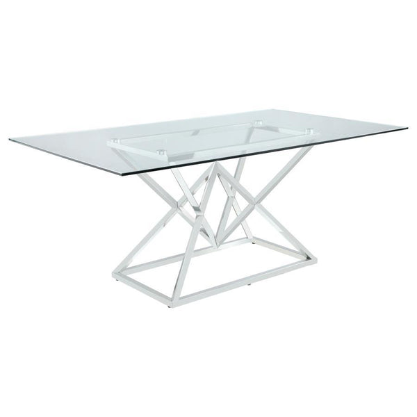 Elevate your dining space with this contemporary dining table featuring a 12mm clear glass top and an artistic polished stainless steel base. The angular geometric design adds a modern flair, while the rectangular shape offers generous space for entertain