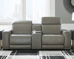 Truly putting high design into recline, this power loveseat with gray leather match upholstery proves that just because youâ€™re a recliner doesnâ€™t mean you have to look like one. Deceptively beautiful, its ultra clean-lined aesthetic is as cool and con