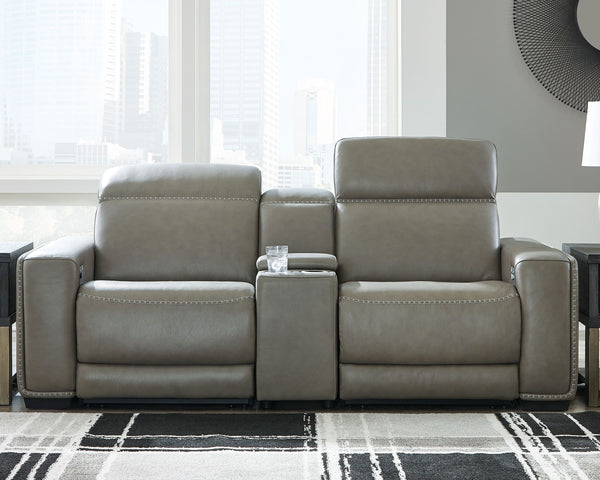 Truly putting high design into recline, this power loveseat with gray leather match upholstery proves that just because youâ€™re a recliner doesnâ€™t mean you have to look like one. Deceptively beautiful, its ultra clean-lined aesthetic is as cool and con