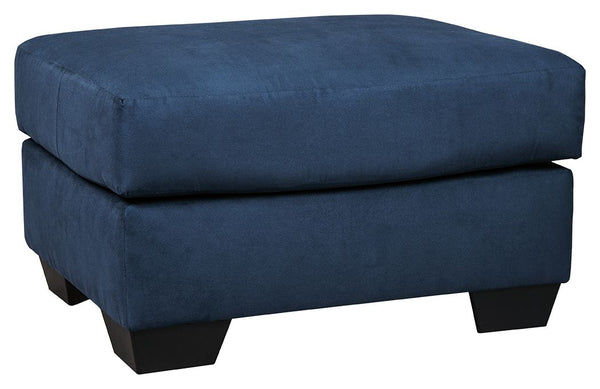 Talk about fine lines and great curves. Thatâ€™s the beauty of this standout ottomanâ€”made to suit your appreciation for simplicity and love of contemporary style. Tapered feet and an ultra-soft upholstery that holds up to everyday living complete this f