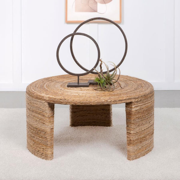  showcasing natural textures and timeless design. Crafted with woven rattan and banana leaf over a durable mahogany and plywood frame