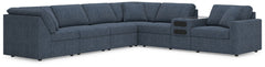 Looking cool and contemporary is great. But when it comes down to it, youâ€™re all about low-maintenance lounging. With the performance fabric on this sectional with audio system, cleaning spills is a breeze. Its customizable modular design caters to your