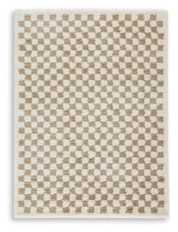 This checkerboard-patterned rug is worth checking out on so many levels. Casually cool and simply striking, its understated neutral palette feels just right everywhere and anywhere. And the ultra-plush shag pile is pure delight.<br/><br/><b>Product Featur