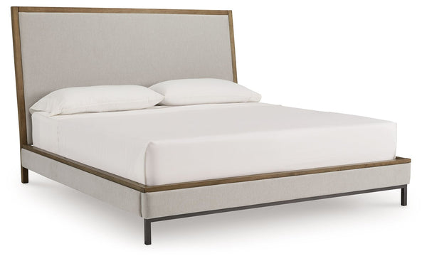 Sleek in its simplicity, this king upholstered bed takes a relaxed approach to refinement. The mixed-material design brings a trendy urban-chic feel to bedtime, while its functional features add convenience. A cushioned lay-back headboard makes reading or
