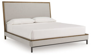 Sleek in its simplicity, this king upholstered bed takes a relaxed approach to refinement. The mixed-material design brings a trendy urban-chic feel to bedtime, while its functional features add convenience. A cushioned lay-back headboard makes reading or