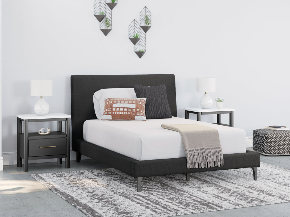 This full upholstered bed reflects your sophisticated approach to boho style. Crafted with both form and function in mind, its black boucle fabric brings trend-right beauty to bedtime. The versatile design suits all-neutral spaces or blends with your favo