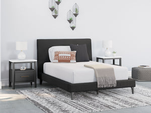  its black boucle fabric brings trend-right beauty to bedtime. The versatile design suits all-neutral spaces or blends with your favo