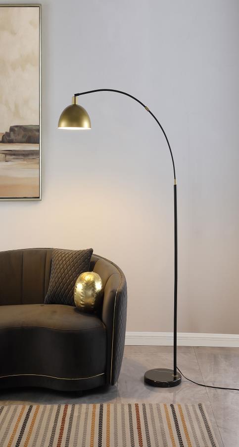  creating weight and stability to support its arcing silhouette. A black finish framework i