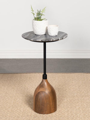  complete with a round top that acquits itself wonderfully in your living room. The top is made from beautiful black mar