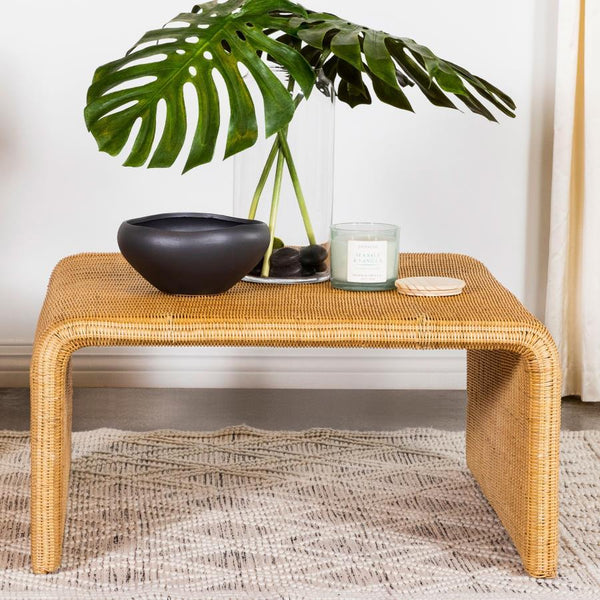  boho touch to your living space with this square coffee table