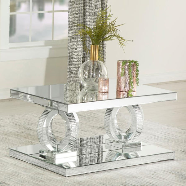  while mirrored surfaces and softly beveled edges amplify its refined aestheti