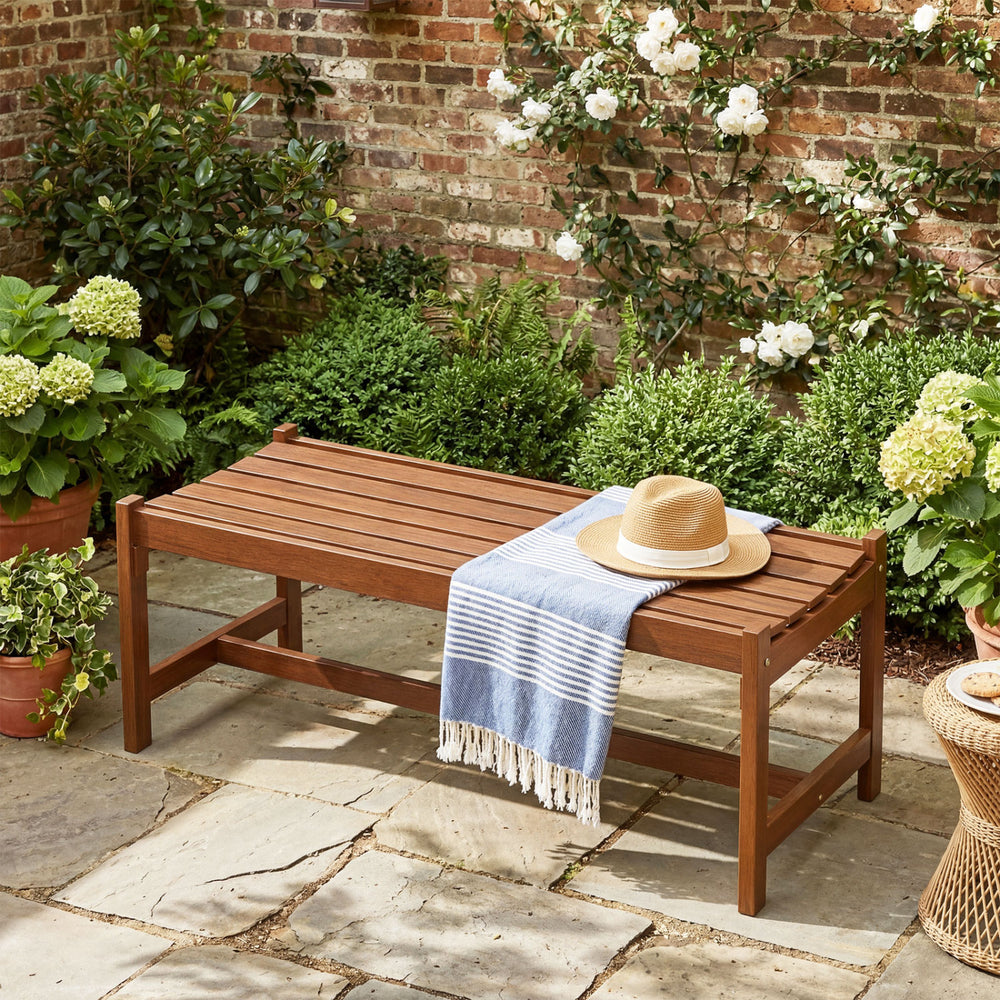 Solid hardwood construction ensures long-lasting outdoor use<br>Teak oil finish provides enhanced protection<br>44-inch wide seat comfortably accommodates 2 adults<br>Curved seat design offers ergonomic comfort and support<br>Breathable slatted seat promo