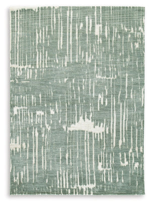 Give your floors a facelift with the abstract design of this rug. It expertly executes a marriage of color and pattern to craft a contemporary feel in your home. Stage it in a room with accent pillows or wall art in matching shades of teal for a monochrom