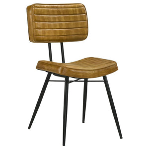 Blending industrial edge with vintage charm, this dining side chair is a striking addition to any dining space. Upholstered in hand-dyed genuine goat leather, the padded seat and backrest offer both comfort and durability. Vertical tufting details enhance