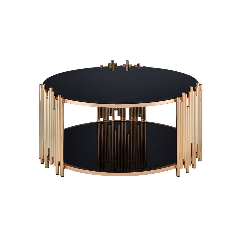 Add a fashion-forward touch of geometry to your living room with the asymmetrical metal tubing detail of the Tanquin black mirror coffee table. This contemporary piece sits on a circular metal drum base with a gold finish and lower shelf. Some Assembly Re