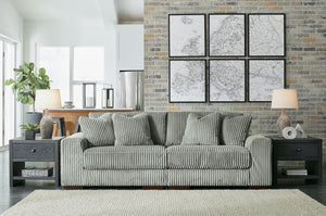 Plush and posh. Showcase your eye for on-trend texture with the statement-making cord upholstery of this sectional loveseat. Its stunningly soft fabric entices in a warm neutral hue, complementing contemporary color palettes. Sink into the cushions and pl