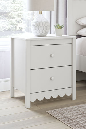  this nightstand is the perfect fit for cottage or coastal farmhouse interiors. The matte white finish serves as the perfect backdrop to showcase your personal taste and creativity. And its spacious drawers let you s