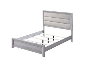  featuring a neutral drift wood finish that complements its clean and contemporary design. The robust bed frame anchors the room with a sense of sturdiness and style. Accompanying the bed ar