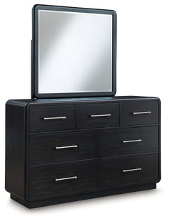Inspired by art deco design, this softly shaped dresser with mirror makes a lasting impression in a simply stunning way. Its magnificent curved silhouette is enhanced by a rich layered black finish on the textured wood grain surface. This is the statement